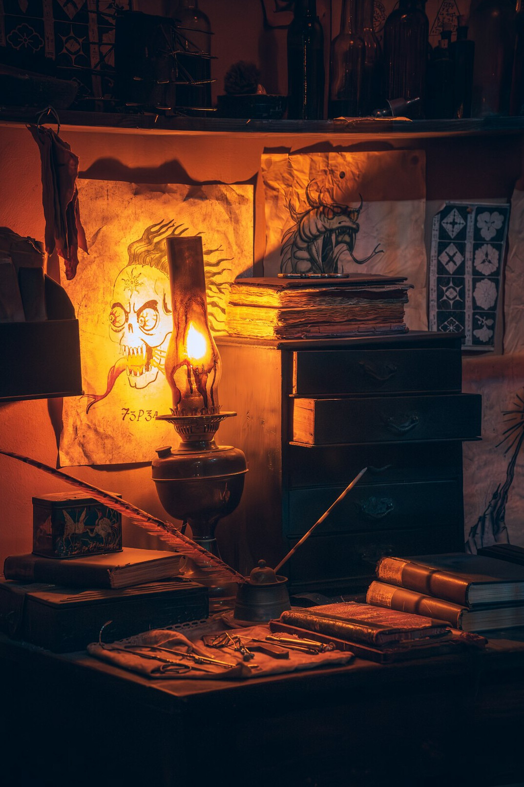 Vintage writing desk with handwritten letters, an inkwell and a desk lamp